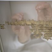 A fragment of a Dead Sea Scroll during the conservation process. Courtesy Leon Levy Dead Sea Scrolls Digital Library, IAA. Photographer: Shai Halevi