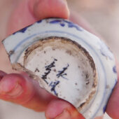 The fragment of the colorful bowl originating in China. Courtesy Emil Aladjem, IAA