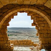 A view of the Negev through an archway at Avdat in the central Negev. Courtesy Nathan Steinmeyer, BAS